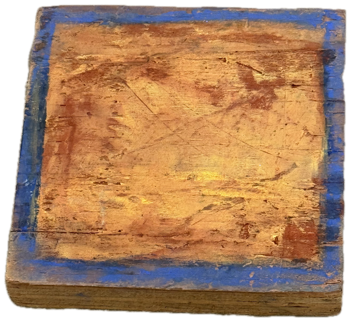 a square block in ochre with a blue edge